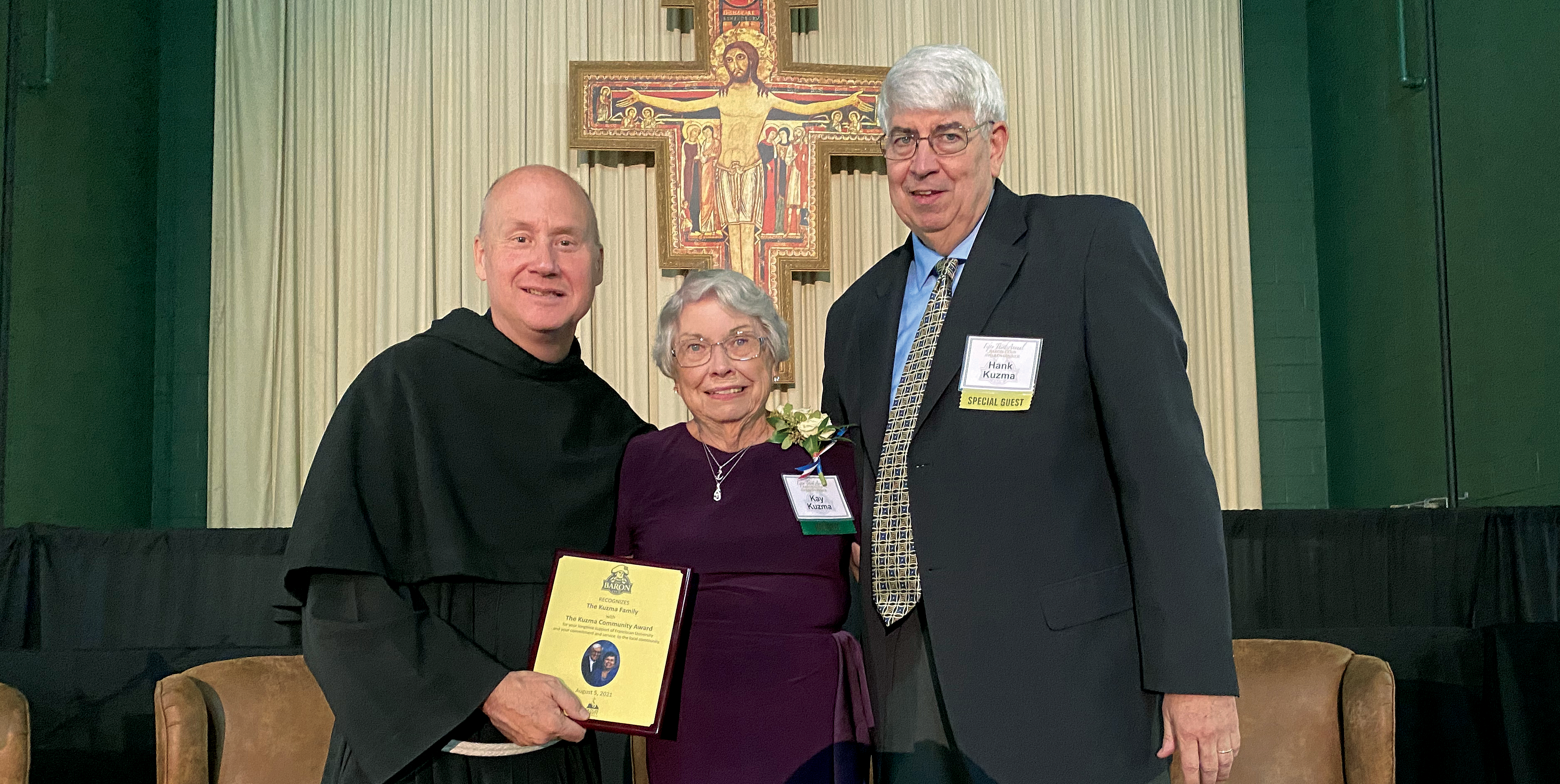 Hank Kuzma Jr. and Kay Kuzma ’55 receive the inaugural Kuzma Community Award.