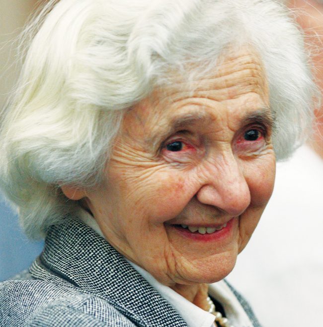 Dr. Alice Von HIldebrand in a blazer with a blurred background.