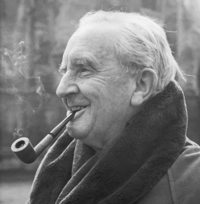 Black and white image of J. R. R. Tolkien smoking a pipe.