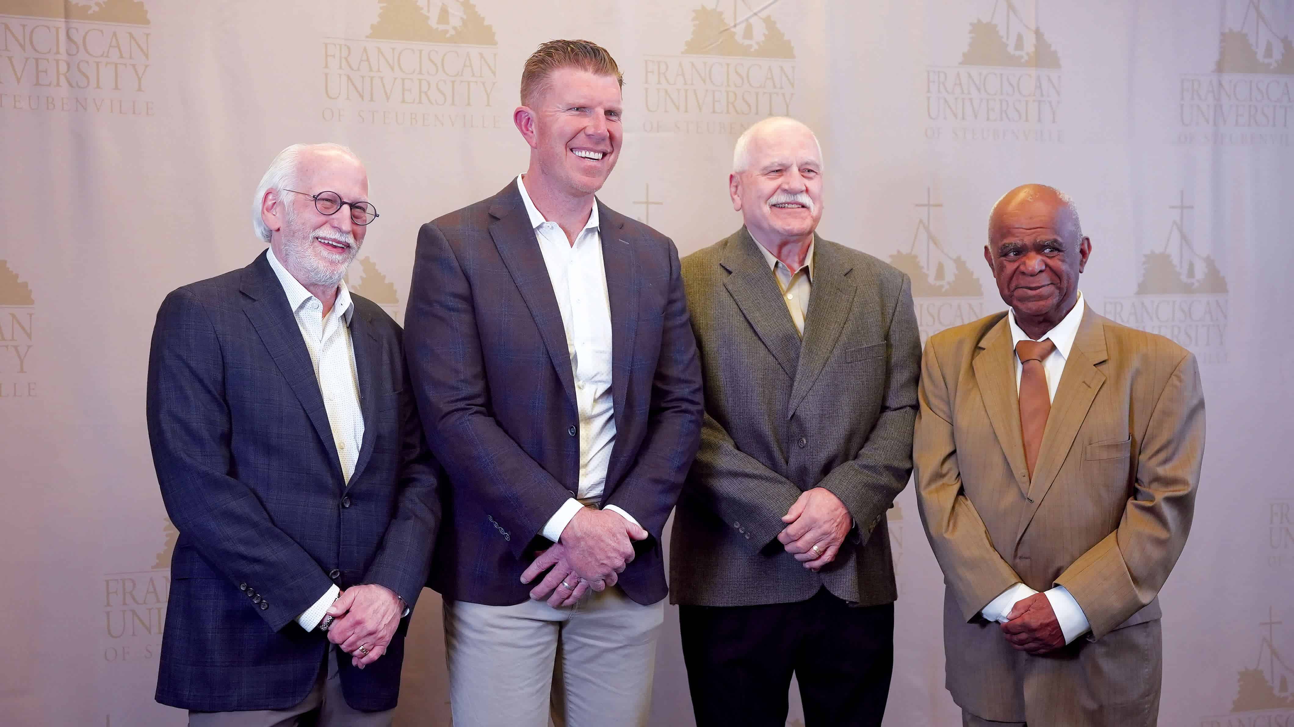 Paul Carapellotti, Matt Birk, Dave Tuttle, and Donald Thorn at the Baron Club Awards Dinner.