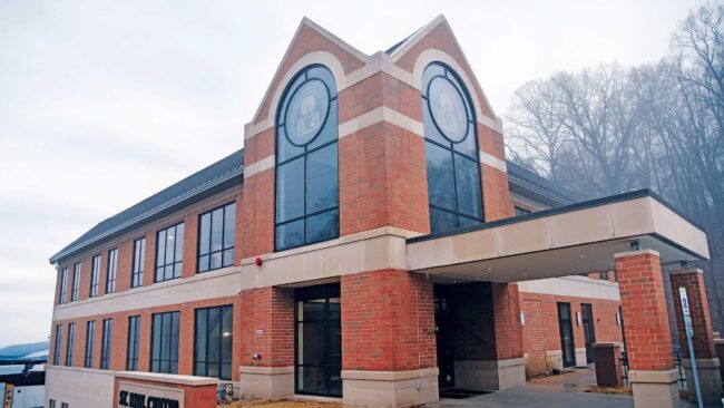 An exterior image of the St. Paul Center on a rainy day.