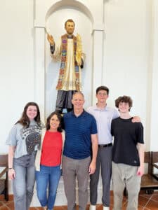 Beckman family in the new Blessed Stanley Rother Shrine in Oklahoma City: Jim ’87, Meg (Forsythe MSE ’95), Claire, Jonathan, and Brian