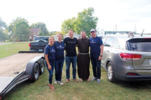 Laura (Roessler ’06) Rousseau, Emily (Bissonnette ’06) Macke, Kevin Heider ’07, Br. Ross Henley, OFM ’08, and Paul Rousseau ’05