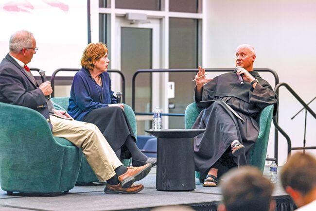 Vice President for Academic Affairs Dr. Stephen Hildebrand, Theology Professor Dr. Deborah Savage, and President Fr. Dave Pivonka, TOR.