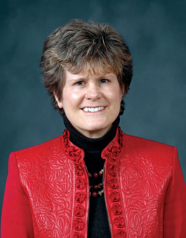Ann Lankford in a red blazer.