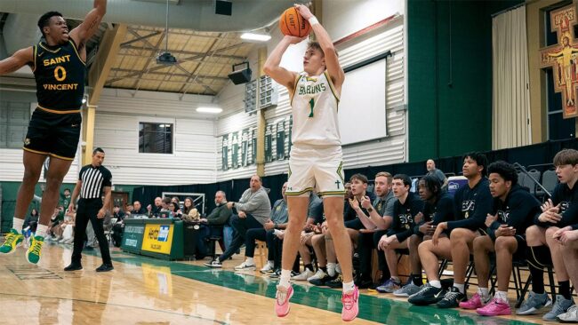 Sawyer Butler going for a shot in a basketball game