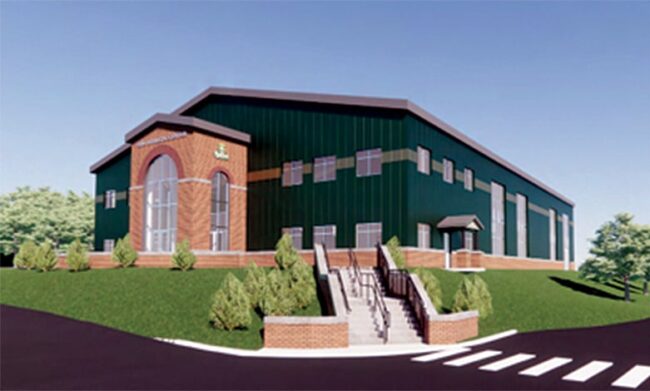 Rendering of a proposed athletic and conference center building, showing a large green-and-brick structure with stairs, landscaping, and a sidewalk in front.