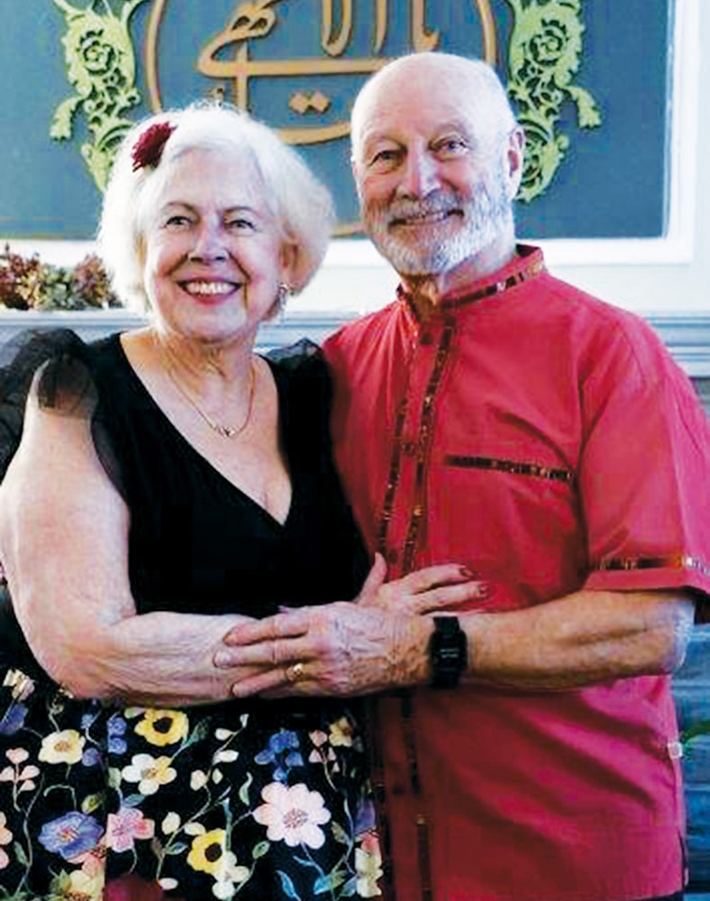 Elinor Mattern ’73 and Joseph Brennan posing for a portrait.